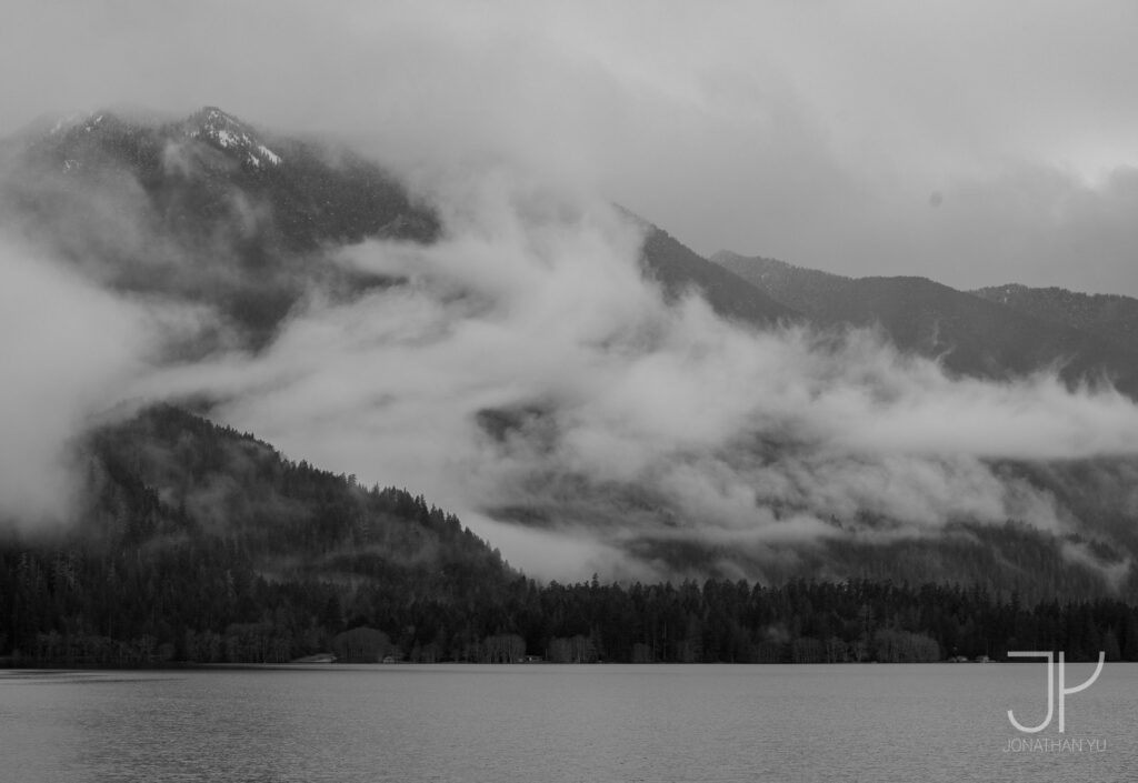 Clouds blow out from the mountains during a brief break in the storm
