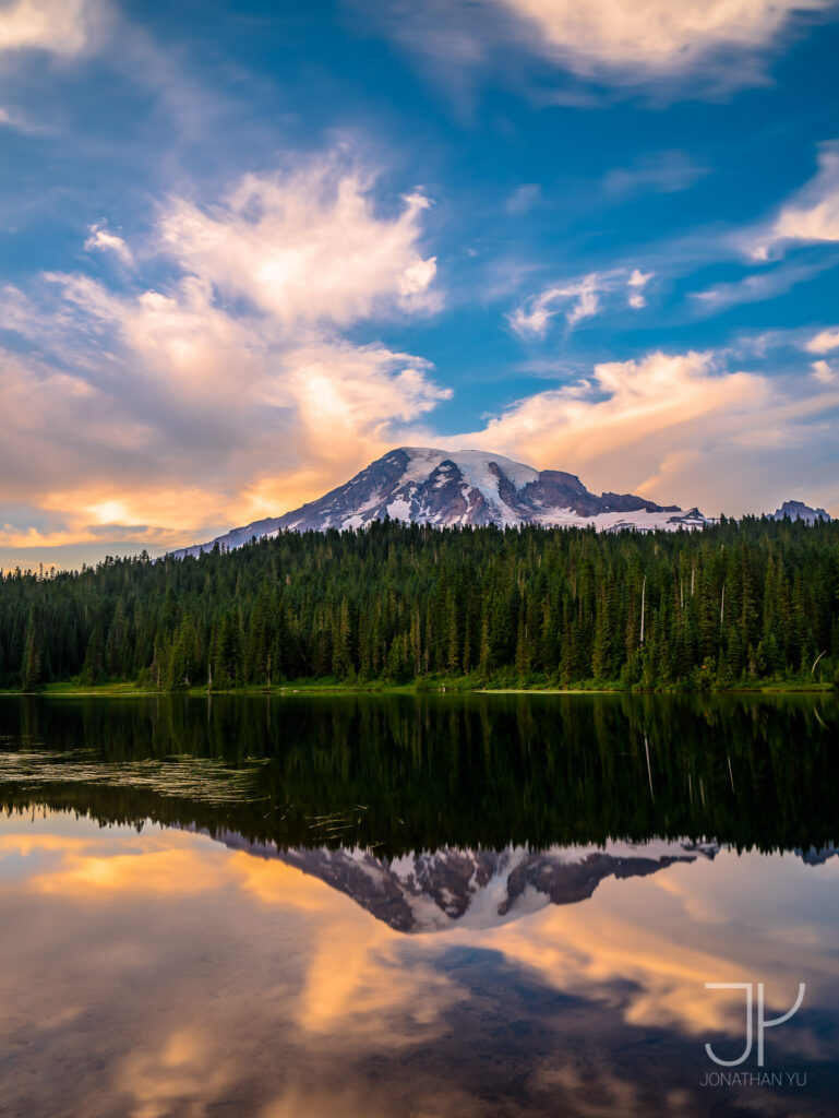Early fiery colors mixed with deep blue skies at Reflection Lake