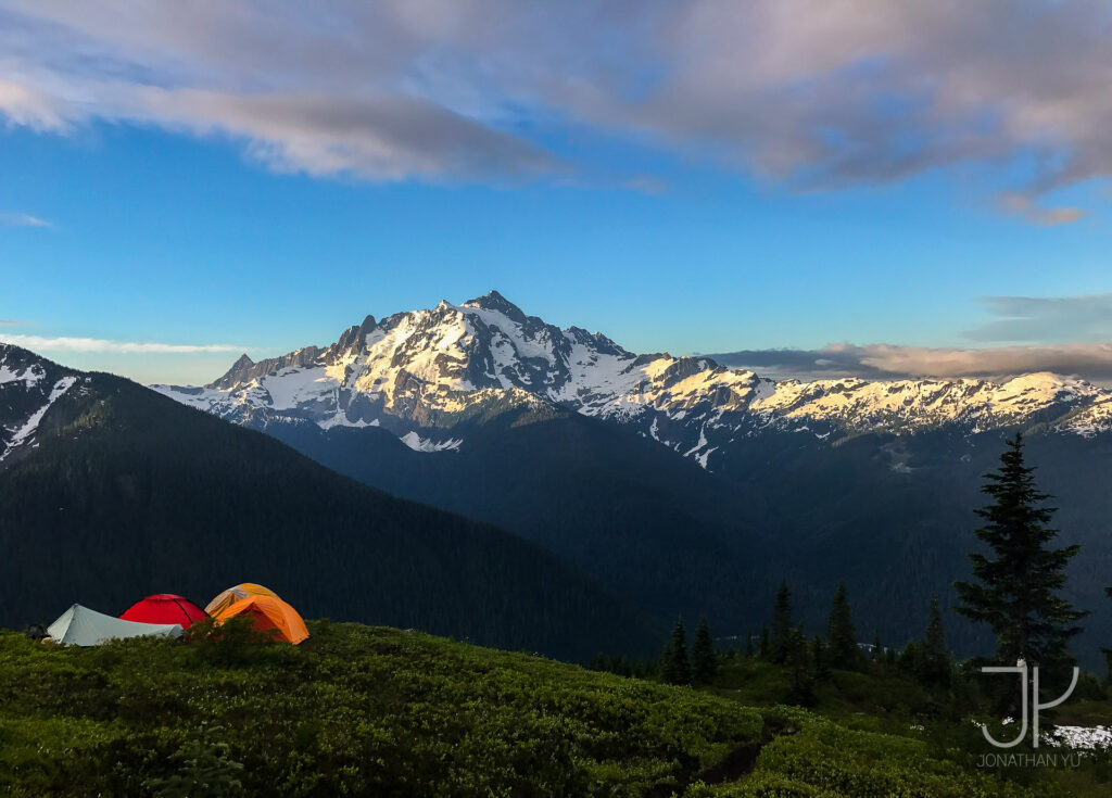 Backpacking under the towering ridges of Mount Shuksan